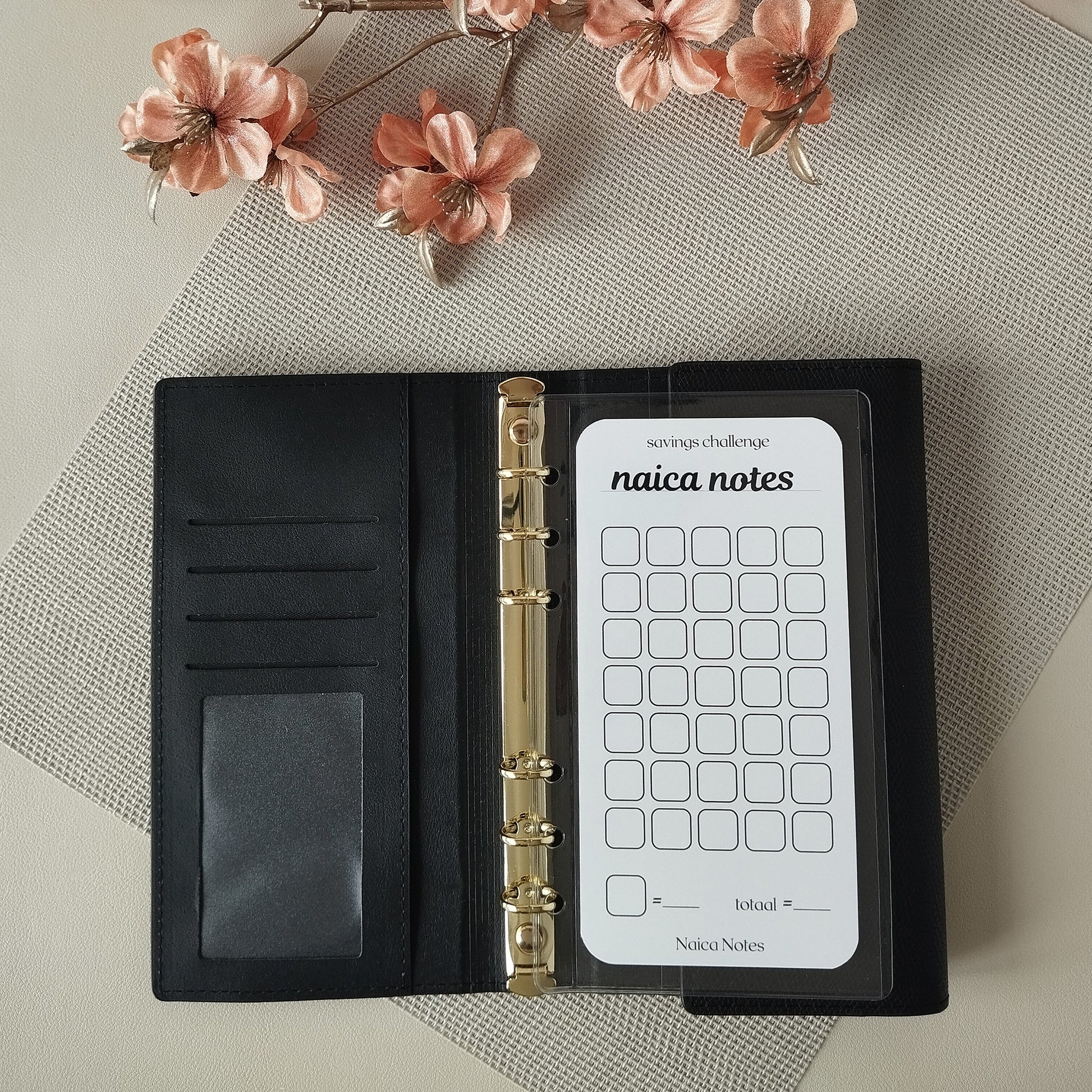 open  elegant zwart louise binder met een savings challenge